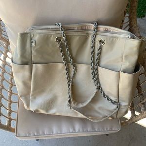 Beis diaper bag (I use for carry on/ travel bag)